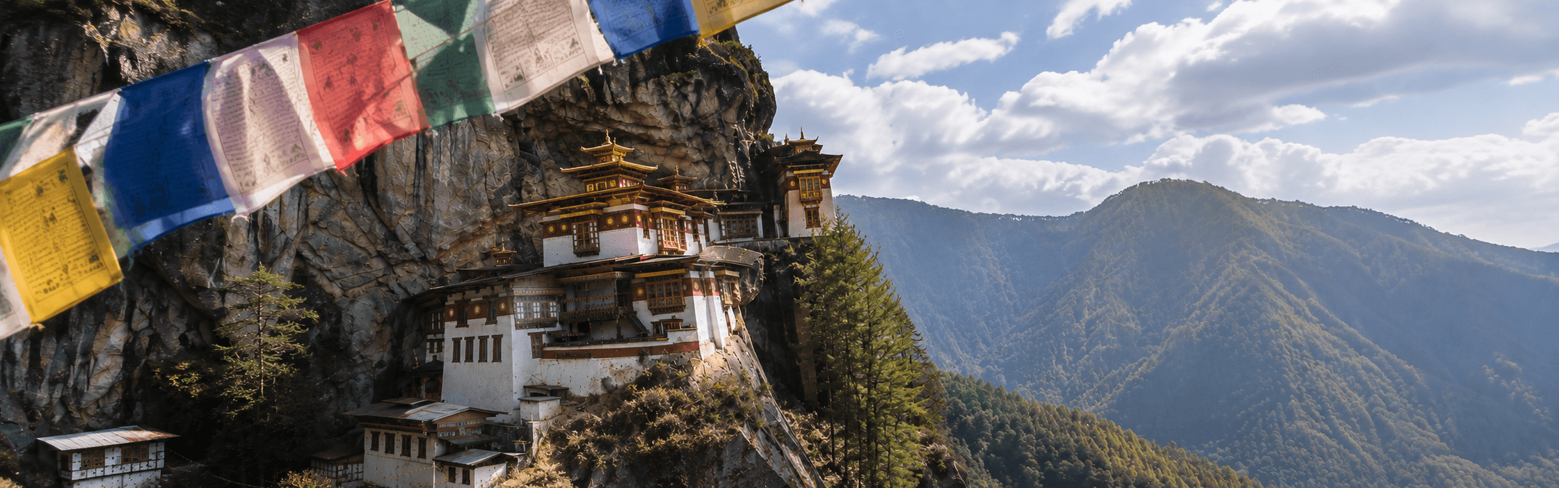 A panoramic view of Bhutan's Himalayan landscape, where centuries-old dzongs, prayer flags, and untouched valleys reflect the country's unique approach to preserving culture, nature, and sustainable tourism.